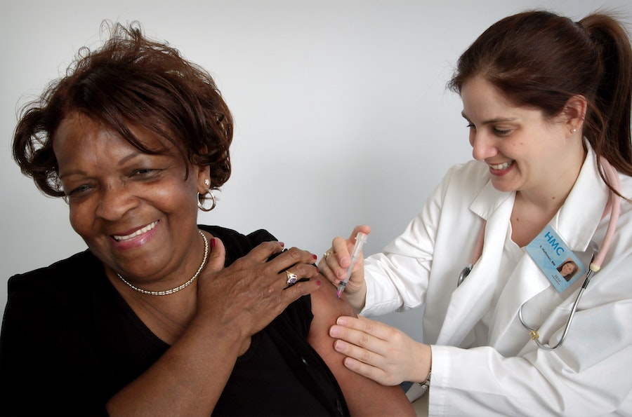 A nurse giving a vaccination